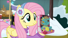 1908303__safe_edit_edited screencap_screencap_sound edit_fluttershy_holly the hearths warmer doll_best gift ever_animated_clothes_female_i love being a.webm